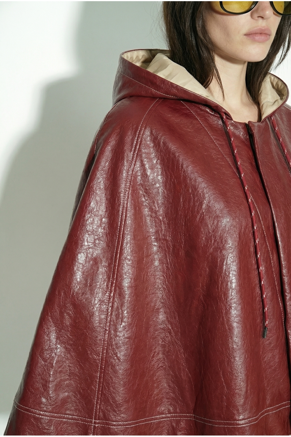 Burgundy vinyl cape made in Italy