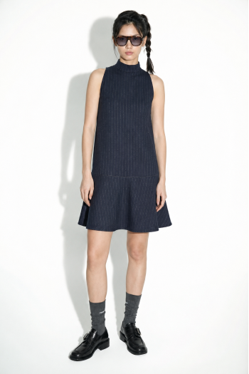 Blake Maura-jurk in marineblauw, gemaakt in Italië.