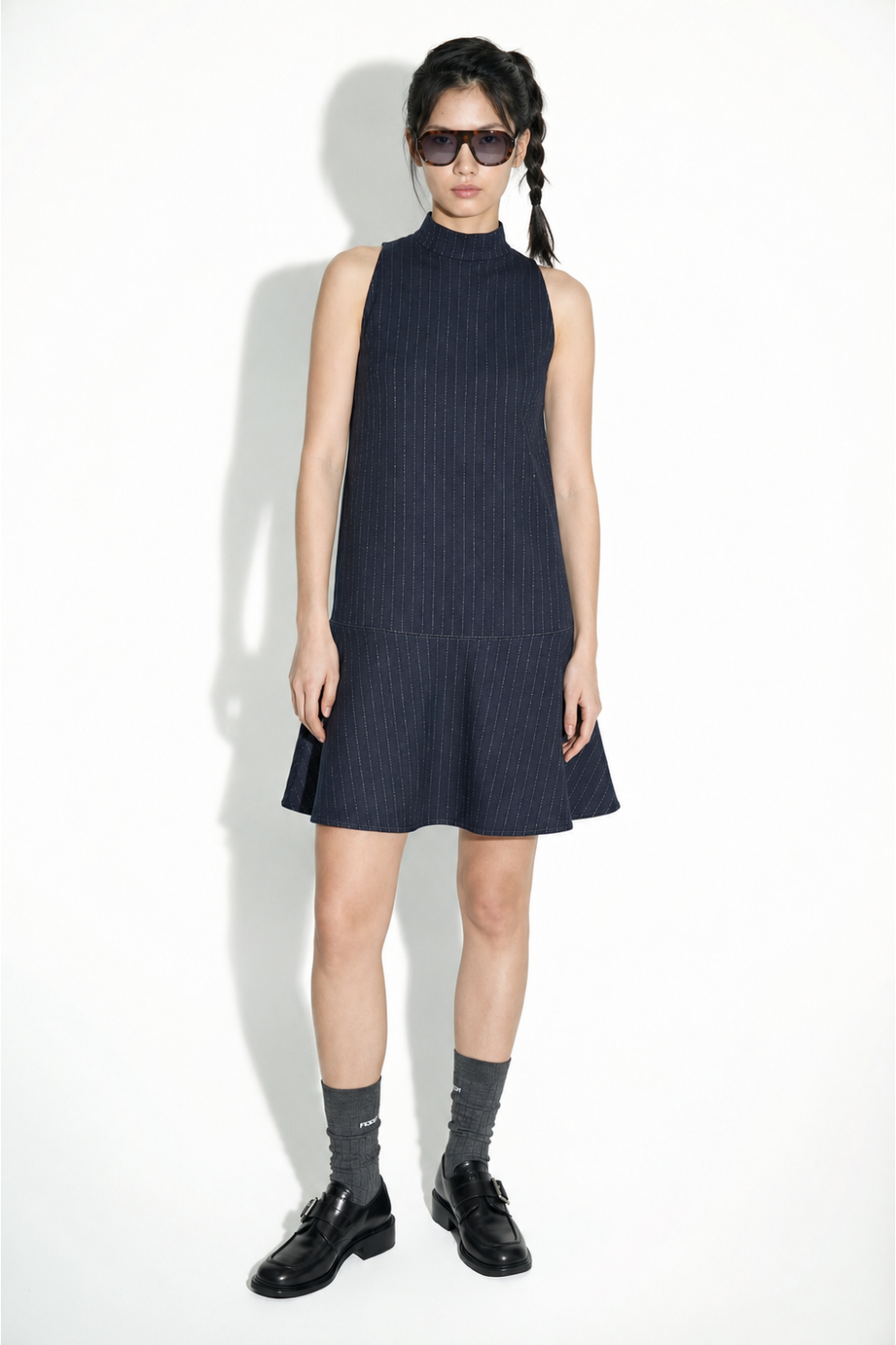 Blake Maura-jurk in marineblauw, gemaakt in Italië.