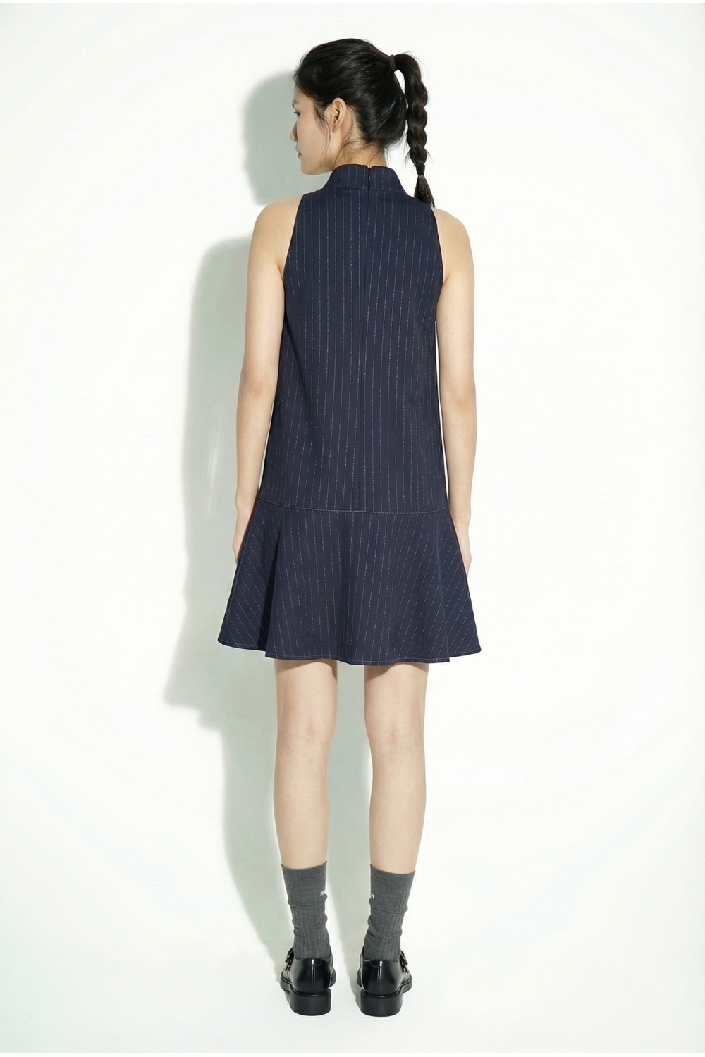Blake Maura-jurk in marineblauw, gemaakt in Italië.
