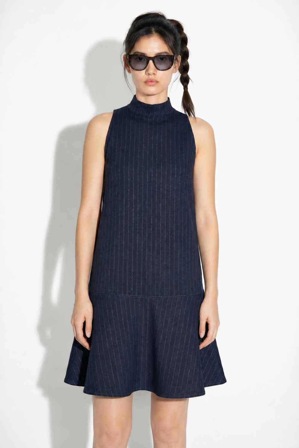 Blake Maura-jurk in marineblauw, gemaakt in Italië.